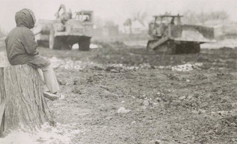 Child watching the destruction of the Rondo Neighborhood in St. Paul