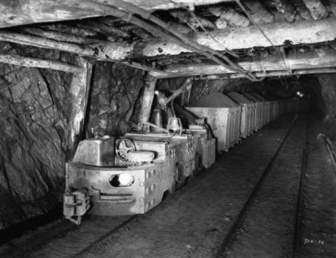 Tramming ore in Pioneer 'A' underground mine, Ely, Minnesota