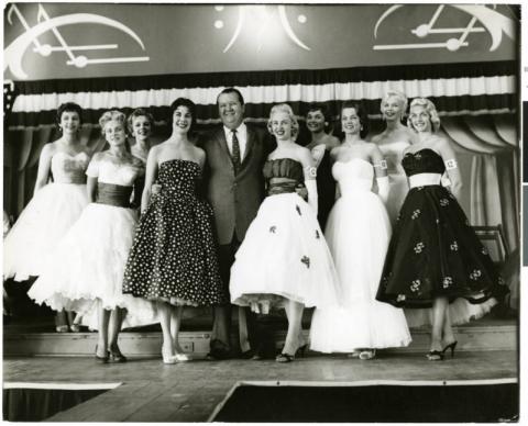 Roy Colihan with contestants of 1957 Miss Minnesota Pageant, Excelsior Amusement Park, Excelsior, Minnesota