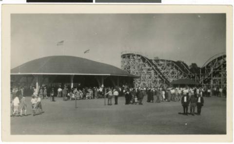 Visitors near the Picnic Pavilion and roller coaster, Excelsior Amusement Park, Excelsior, Minnesota