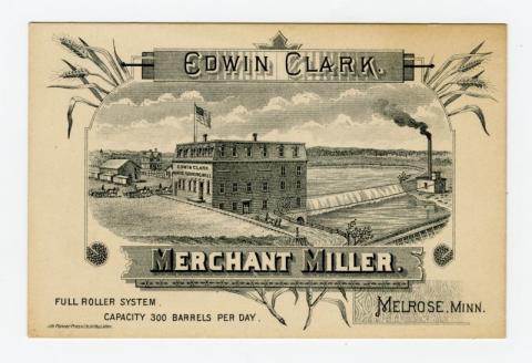 Postcard titled "Edwin Clark: Merchant Miller" with brick building illustration in middle