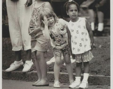 Children watching a parade at the Rondo Days Festival