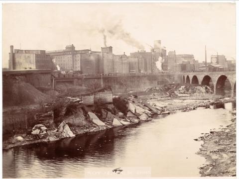 Industrial mill buildings along a river