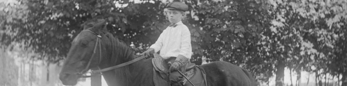 Portrait of Sterling Hawkes at the age of 8 on horse, Waseca, Minnesota