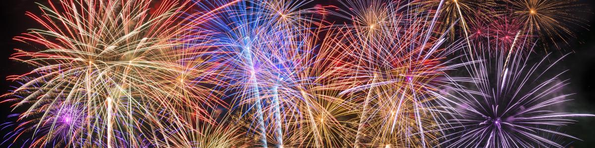 Fireworks exploding on black background